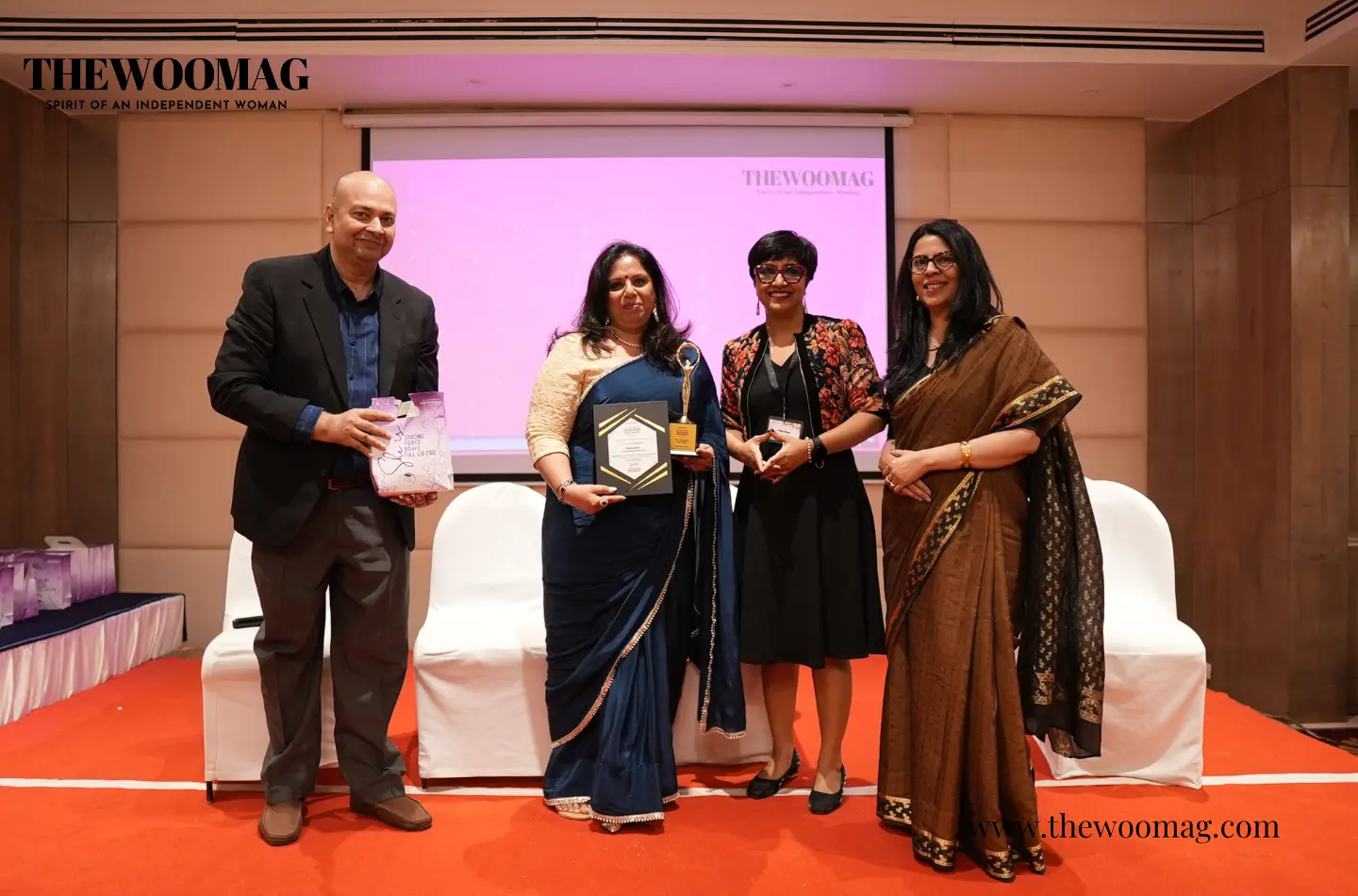 cover-Malinie-Arora--receiving-award-himanshi-lydia-singh-at-unstoppable-summit.webp